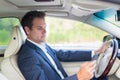 Man using cell phone while driving Royalty Free Stock Photo