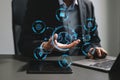 Man using chatbot in computer and tablet smart intelligence Ai.Chat with AI Artificial Intelligence, developed by OpenAI generate Royalty Free Stock Photo
