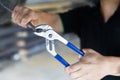 Skilled Man Using Clamping Tool for the Tasks Ahead Royalty Free Stock Photo