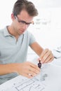 Man using compass on design Royalty Free Stock Photo