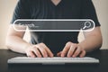 Man using computer keyboard for searching and browsing internet information. Using search bar on website. Computer data technology Royalty Free Stock Photo