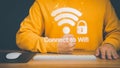 Man using a computer keyboard to connect to wifi and waiting to loading digital business data form website. Royalty Free Stock Photo