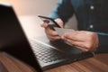 Man using credit card for purchasing and shopping online on mobile phone. Mobile payment with wallet app technology. Royalty Free Stock Photo