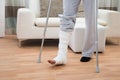 Man using crutches for walking Royalty Free Stock Photo