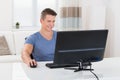 Man Using Desktop Computer