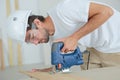 Man using electric jigsaw Royalty Free Stock Photo