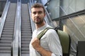 Man using the escalators to move around a modern building Royalty Free Stock Photo