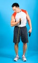 Man using exercise tubing to strengthen upper arm. Royalty Free Stock Photo