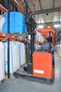 Man using forklift in warehouse Royalty Free Stock Photo