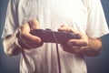 Man using game pad controller to play video games Royalty Free Stock Photo