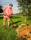 Man Using Grass Trimmer Royalty Free Stock Photo