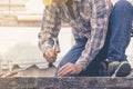 The man using a hammer to nail concrete. Royalty Free Stock Photo