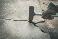 Man using hammers for breaking the broken concrete. Power