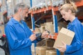 Man using handsfree computer and scanner on parcel