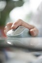 Man using his forefinger to control a cordless mouse Royalty Free Stock Photo