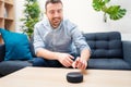 Man using home assistant bluetooth speaker Royalty Free Stock Photo