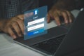 Man using keyboard computer laptop login interface on touch screen. user name and password inputs on virtual digital account Royalty Free Stock Photo