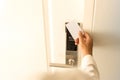 Man using keycard contactless for unlock door in hotel. Royalty Free Stock Photo