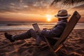 Man using laptop on the beach at sunset. Vacation concept, man lying on the sand of the beach with a laptop working at sunset over