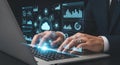 Man using laptop with cloud computing and data analytics interface overlaying the keyboard and screen Royalty Free Stock Photo