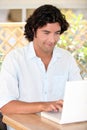 Man using a laptop computer Royalty Free Stock Photo