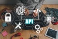 Man using laptop computer with touch screen interface and select API icon, Software Royalty Free Stock Photo