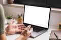 Man using laptop computer for video conference call at home, mockup screen for app interface or online communication concept, Royalty Free Stock Photo