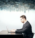 Man using laptop at desk Royalty Free Stock Photo