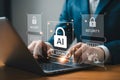Man using laptop with digital security interface Royalty Free Stock Photo