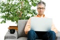 Man using laptop at home Royalty Free Stock Photo