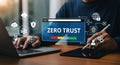 Zero Trust Cybersecurity Concept with Person Using Laptop and Tablet for Data Protection and Network Security Royalty Free Stock Photo