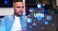 Man using laptop, VPN hologram and cybersecurity, anonymous conn