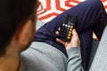 Man using latest iPhone XS unboxing display calculator app