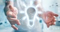 Man using lightbulb neon digital interface 3D rendering
