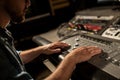 Man using mixing console in music recording studio Royalty Free Stock Photo