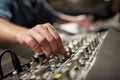 Man using mixing console in music recording studio Royalty Free Stock Photo