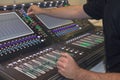 Man using mixing console in sound recording studio Royalty Free Stock Photo