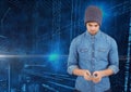 Man using mobile phone with binary codes on blue background Royalty Free Stock Photo