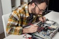 man using multimeter while fixing computer Royalty Free Stock Photo
