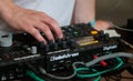 Man using music synthesizers at sonar