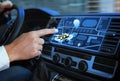 Man using navigation system while driving car