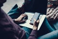 Man using netbook and telephone while sitting in cafe Royalty Free Stock Photo