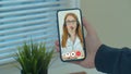 Man using online chat to talk with professional therapist and checks possible symptoms during. Mman using medical app on