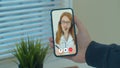 Man using online chat to talk with professional therapist and checks possible symptoms during. Mman using medical app on