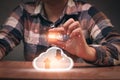 Man using phone to upload and back up cloud computing in hand cloud technology data storage Royalty Free Stock Photo