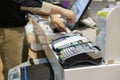 Man using pos terminal at the shop paying credit card for purch Royalty Free Stock Photo