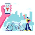 Man Using Smartphone Application of Bike Rent Service Searching in Big City. Hand Holding Phone with Bicycle Geolocation Gps Mark Royalty Free Stock Photo