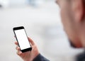 Man using smartphone with blank screen mockup