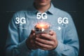 Man using smartphone with new generation network technology connection like g g and g wireless communication Royalty Free Stock Photo