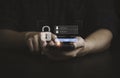 Man using smartphone to input username and password for technology security system and prevent hacker concept Royalty Free Stock Photo